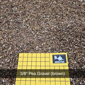 Yellow square grid on brown 3/8" pea gravel. Text reads "3/8'' Pea Gravel (brown)" and "1 inch squares.